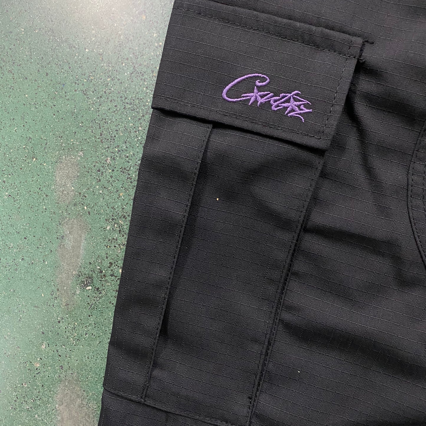 Corteiz Guerillaz Cargo Pants Black Purple