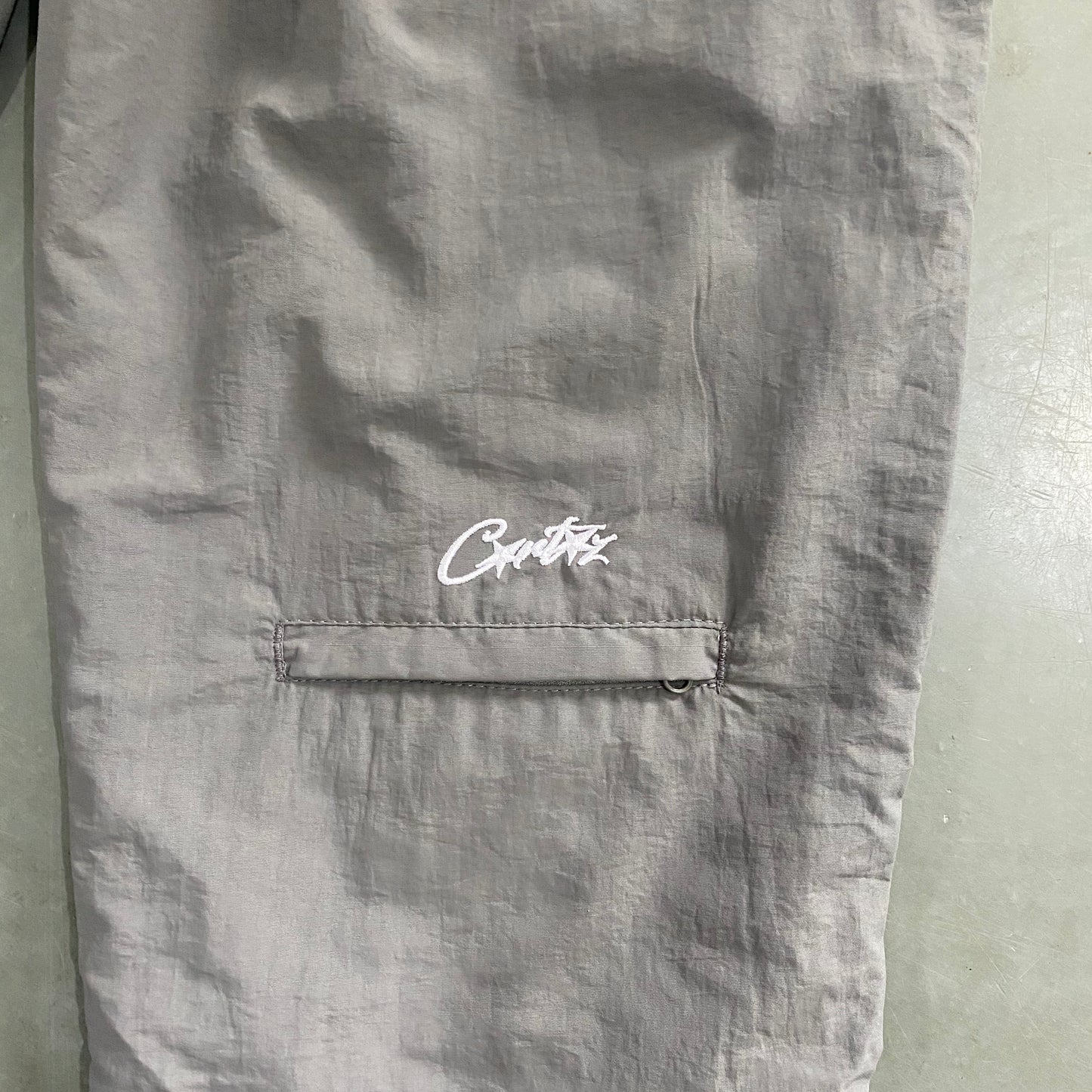 Corteiz Shukushuku Track Pants Grey