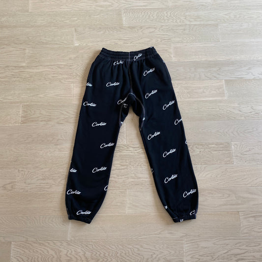 Corteiz All Over Print Joggers Black White