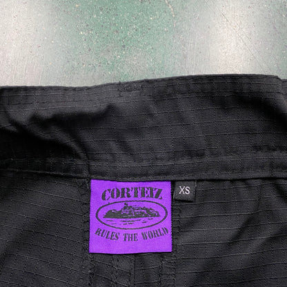 Corteiz Guerillaz Cargo Pants Black Purple