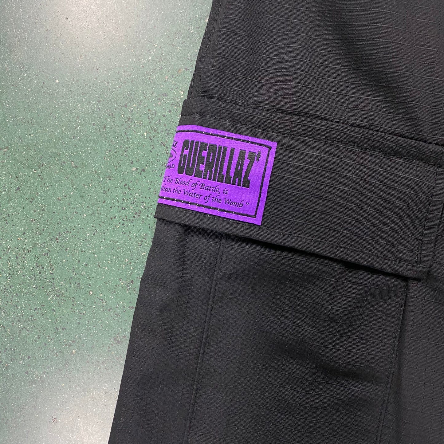 Corteiz Guerillaz Cargo Pants Black Purple