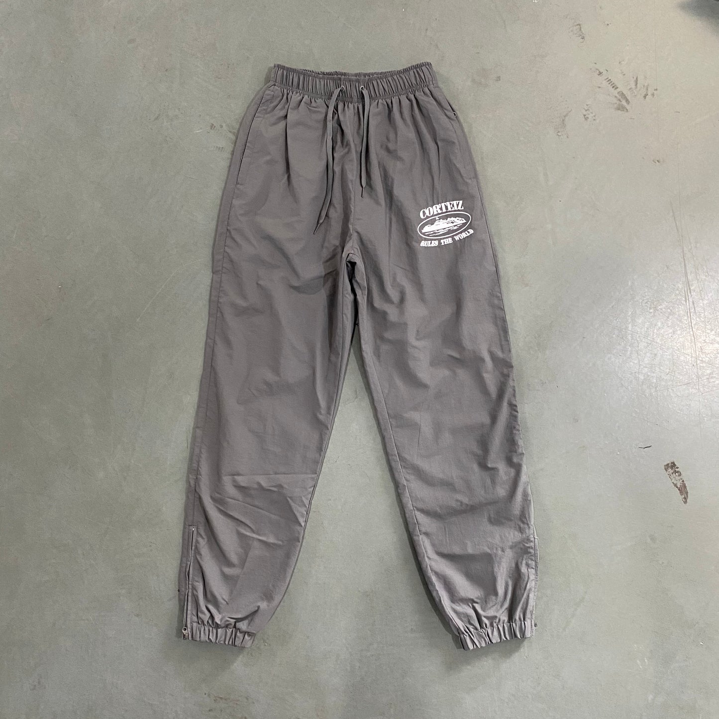 Corteiz Shukushuku Track Pants Grey