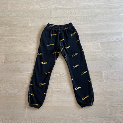 Corteiz All Over Print Joggers Black Yellow