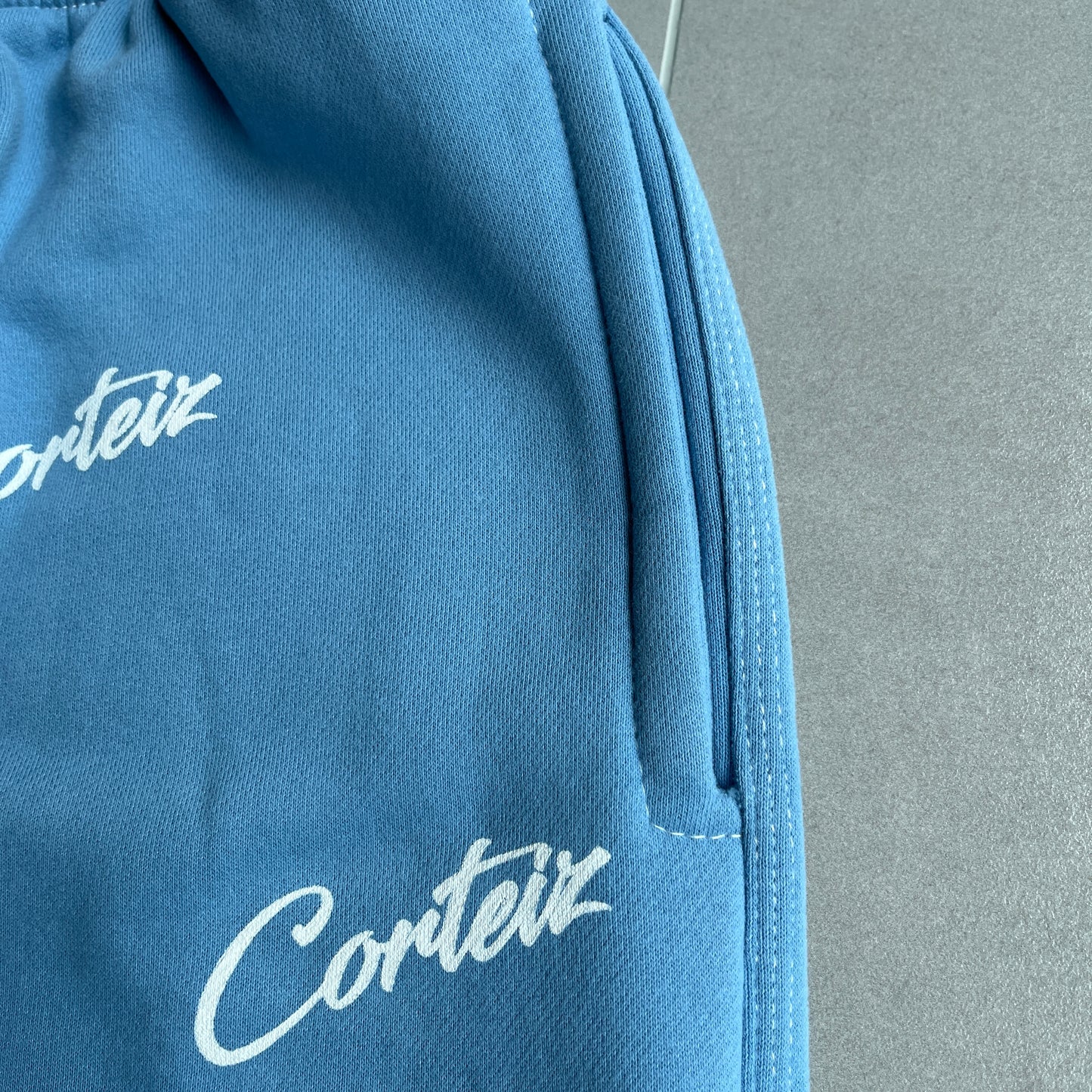 Corteiz All Over Print Joggers Baby Blue