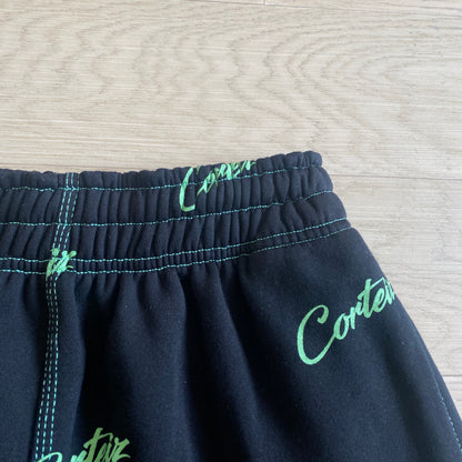 Corteiz All Over Print Joggers Black Green