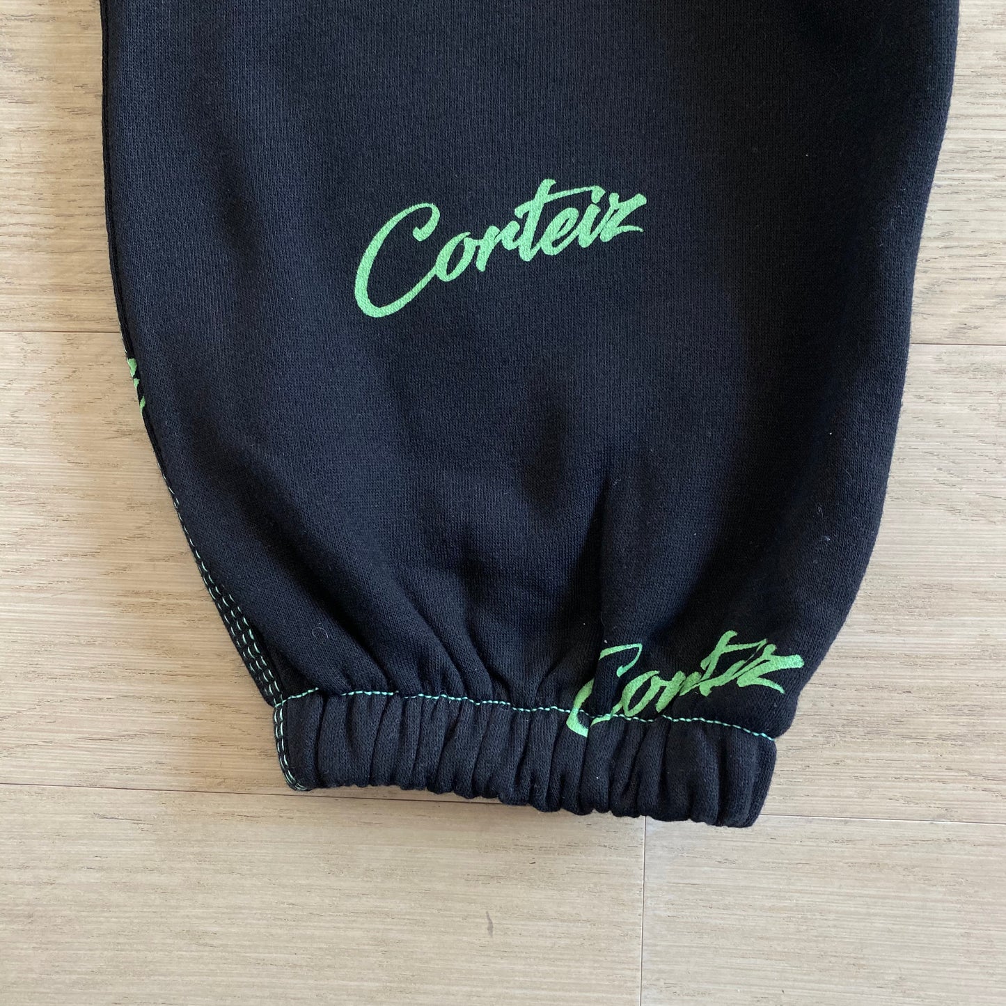 Corteiz All Over Print Joggers Black Green