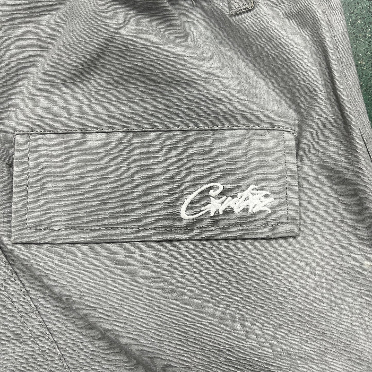 Corteiz Guerillaz Cargo Pants Stone Grey