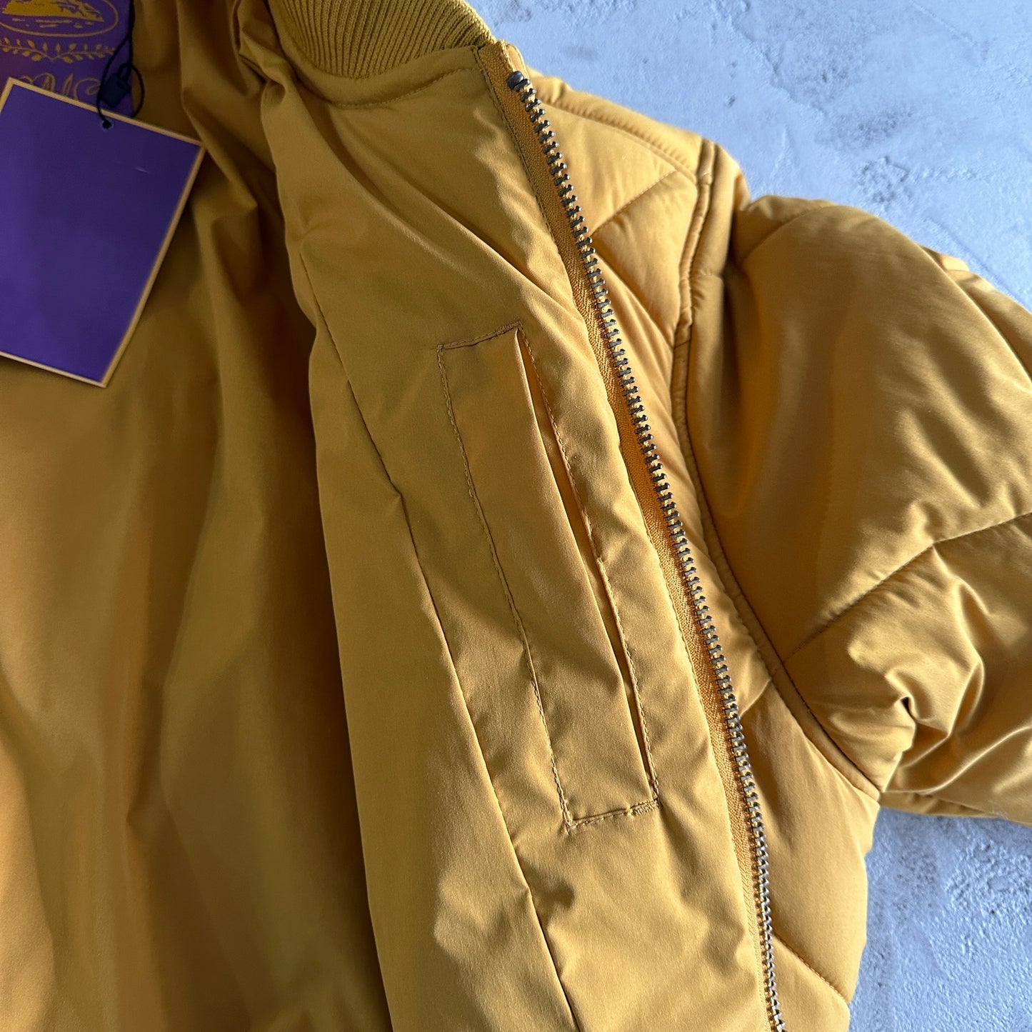 Corteiz Olde English Quilted Bomber Jacket Yellow