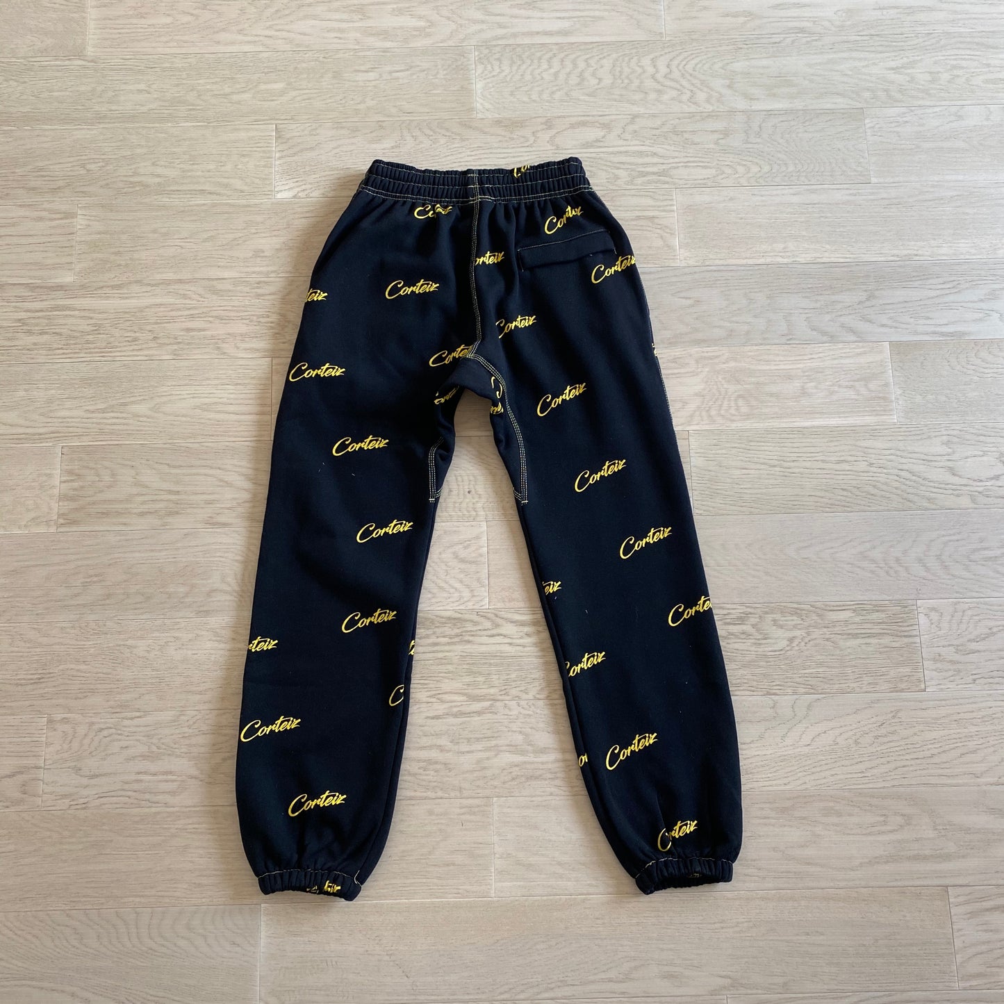 Corteiz All Over Print Joggers Black Yellow