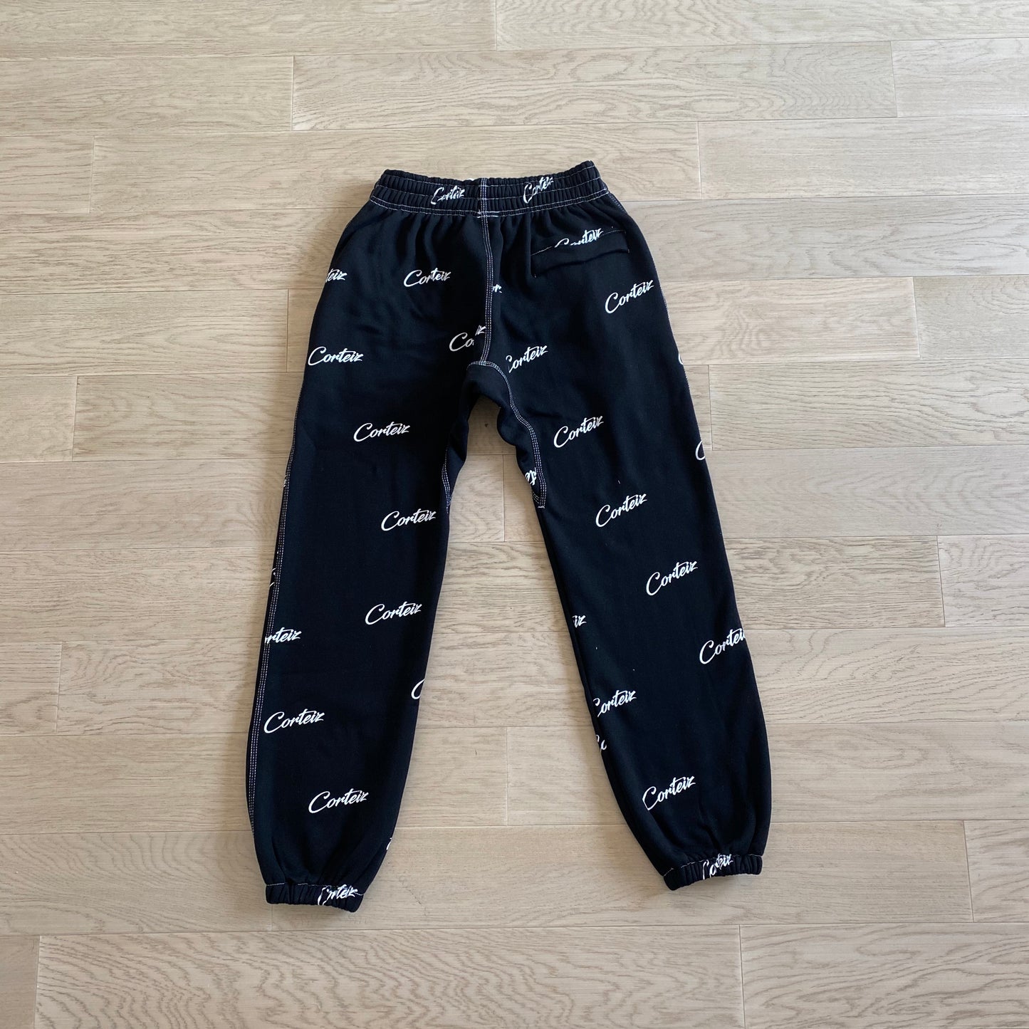 Corteiz All Over Print Joggers Black White