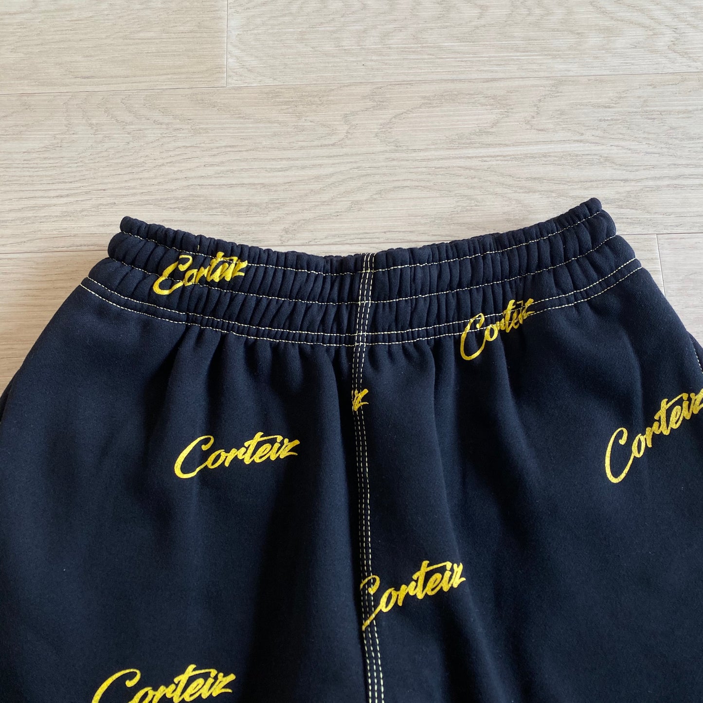 Corteiz All Over Print Joggers Black Yellow